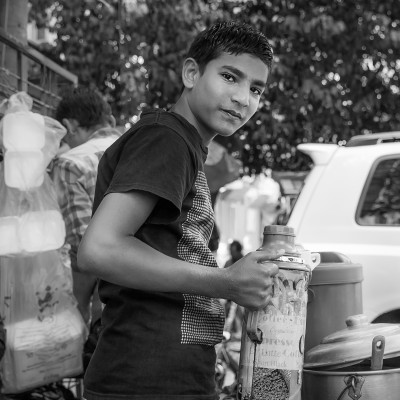 Young street worker Rangoon B&W
