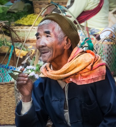 Old Man Smoking Traditional Burma's Cigar Market Inle Lake-5228-Modifier