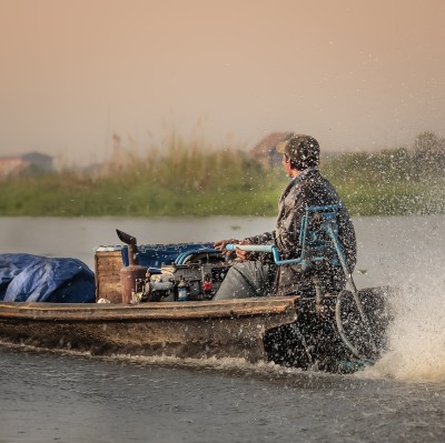 Boat Sailer at Sun Set Inle